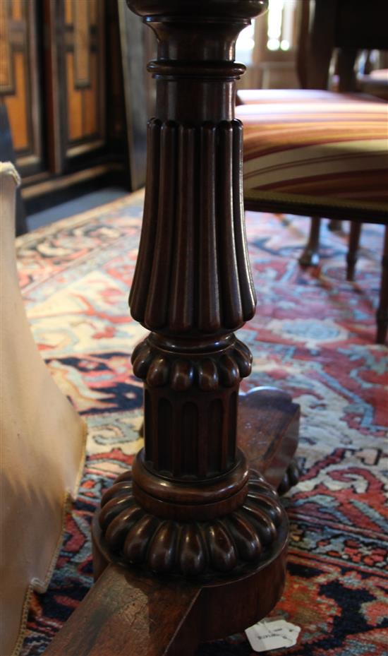 A Regency rosewood library table, W.4ft D.2ft 4in. H.2ft 5in.